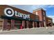 Exterior of a well-maintained Target store featuring its iconic logo and brick facade with ample parking at 14497 E 1St Dr # B3, Aurora, CO 80011