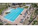 Aerial view of a luxurious community pool area with ample seating and landscaping at 11330 Pacific Peak Ct, Parker, CO 80134