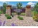 Stone and iron entrance sign to Senderos Creek neighborhood at 11330 Pacific Peak Ct, Parker, CO 80134