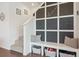 Inviting entryway with decorative wall accents and storage bench at 11330 Pacific Peak Ct, Parker, CO 80134
