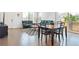 Open-concept living area with hardwood floors and modern furnishings at 11330 Pacific Peak Ct, Parker, CO 80134