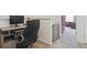 Open office space features carpet flooring and easy access to nearby bedrooms at 11330 Pacific Peak Ct, Parker, CO 80134