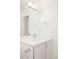 Bright bathroom features a modern vanity, sleek fixtures, and ample mirror space at 2685 S Acoma St, Denver, CO 80223