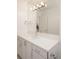 Bright bathroom features a modern vanity, sleek fixtures, and ample mirror space at 2685 S Acoma St, Denver, CO 80223