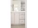 Bathroom featuring a modern vanity with sleek cabinetry and stylish fixtures and finishes at 2685 S Acoma St, Denver, CO 80223