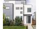 Contemporary two-story home features a simple, clean design and minimalist landscaping at 2685 S Acoma St, Denver, CO 80223