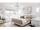 Inviting main bedroom suite with large window and neutral decor at 2685 S Acoma St, Denver, CO 80223