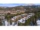 Aerial view of a mountain town nestled in the Rockies with a variety of multi-Gathering housing and beautiful scenery at 43 Snowflake Dr # D7, Breckenridge, CO 80424