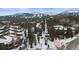 Aerial image showing residences, trees, ski trails, and the Snowflake Chairlift at 43 Snowflake Dr # D7, Breckenridge, CO 80424