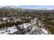Beautiful aerial view of the snowy community with majestic mountain backdrop and wooded areas at 43 Snowflake Dr # D7, Breckenridge, CO 80424