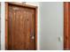 Close up of a sturdy wood door with a digital entry lock at 43 Snowflake Dr # D7, Breckenridge, CO 80424