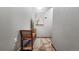 Hallway showcasing a tiled floor, bench seating, a wall decoration, and a calming neutral paint scheme at 43 Snowflake Dr # D7, Breckenridge, CO 80424