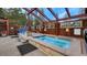 Relaxing hot tubs within a partially enclosed structure and surrounded by a beautiful mountain landscape at 43 Snowflake Dr # D7, Breckenridge, CO 80424