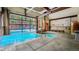 Spacious indoor pool area features both a large pool and a relaxing hot tub with a mountain view at 43 Snowflake Dr # D7, Breckenridge, CO 80424