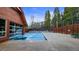 Outdoor pool area featuring an in-ground pool and partial enclosure offering both outdoor and indoor swimming options at 43 Snowflake Dr # D7, Breckenridge, CO 80424