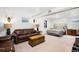 Finished basement with a comfortable seating area, a bed, and neutral color palettes at 7695 S Sheridan Ct, Littleton, CO 80128
