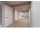 Finished basement area featuring neutral tones, carpet, and recessed lighting, offering versatile space at 13241 Heart Lake Way, Broomfield, CO 80020