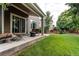 Charming patio with outdoor seating overlooking the backyard at 13241 Heart Lake Way, Broomfield, CO 80020