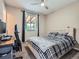 Cozy bedroom with neutral walls, carpet flooring, and a ceiling fan at 15642 E Eldorado Dr, Aurora, CO 80013