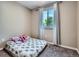 Bedroom with carpet and a window providing ample natural light at 15642 E Eldorado Dr, Aurora, CO 80013
