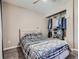Comfortable bedroom with neutral walls, carpet flooring, and a closet at 15642 E Eldorado Dr, Aurora, CO 80013