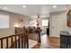 Cozy upstairs living area with comfortable seating and stylish decor, perfect for relaxation and entertainment at 27790 E 9Th Pl, Aurora, CO 80018