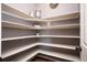 Well-organized pantry with ample shelving for storage solutions, ensuring a clutter-free kitchen at 27790 E 9Th Pl, Aurora, CO 80018