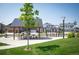 Community playground and park featuring a shaded picnic area and climbing structure at 27790 E 9Th Pl, Aurora, CO 80018