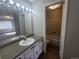 Bathroom featuring a vanity, large mirror, and separate room for the shower and toilet at 9650 Huron St # 23, Thornton, CO 80260