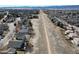 A distant aerial view showing the house's location in the surrounding area and community at 1164 English Sparrow Trl, Highlands Ranch, CO 80129