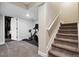 Basement featuring stairs, workout equipment and storage room at 1164 English Sparrow Trl, Highlands Ranch, CO 80129