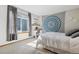 Bedroom featuring large window, white desk and tapestry at 1164 English Sparrow Trl, Highlands Ranch, CO 80129