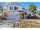 Charming two-story home with attached garage and brick accents at 1164 English Sparrow Trl, Highlands Ranch, CO 80129