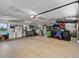 Spacious garage with ample storage space, a kitchenette, and mountain views at 1194 Snyder Mountain Rd, Evergreen, CO 80439