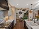 Gourmet kitchen with stainless steel appliances and stone accents at 1194 Snyder Mountain Rd, Evergreen, CO 80439