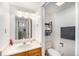 Bathroom with a sink, toilet, and wood vanity at 6700 W 11Th Ave # 205, Lakewood, CO 80214