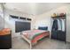 Cozy bedroom with a chalkboard wall and dresser at 6700 W 11Th Ave # 205, Lakewood, CO 80214