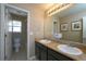 The bathroom includes dual sinks, granite counters, and a separate toilet and shower at 14193 Double Dutch Cir, Parker, CO 80134