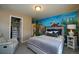 This bedroom features a Harry Potter themed wall mural, a twin bed and sitting area at 14193 Double Dutch Cir, Parker, CO 80134