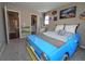 Fun bedroom with carpet features a car shaped bed and Hot Wheels themed wall decor at 14193 Double Dutch Cir, Parker, CO 80134