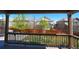 View from the covered patio showcasing the fenced backyard and surrounding neighborhood at 14193 Double Dutch Cir, Parker, CO 80134