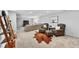 Spacious finished basement with a large sectional sofa and plush seating area at 8896 W Prentice Ave, Littleton, CO 80123