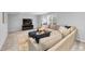 Basement Gathering room showcases a sectional sofa and large screen television at 8896 W Prentice Ave, Littleton, CO 80123