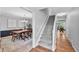 Spacious entryway leading to a dining room and stairwell at 8896 W Prentice Ave, Littleton, CO 80123