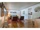 Bright living room featuring hardwood floors, stylish furnishings, and an open layout at 2083 W Arbor Ave, Littleton, CO 80120