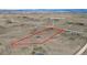 Aerial view shows the property's boundaries at 30484 Chisholm Trl, Elizabeth, CO 80107