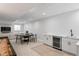 Finished basement area with dining table, bar area and entertainment setup at 30484 Chisholm Trl, Elizabeth, CO 80107