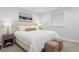 Neutral bedroom with contemporary decor, side tables and lamps at 30484 Chisholm Trl, Elizabeth, CO 80107
