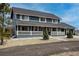 Charming two-story home featuring a welcoming front porch and beautifully landscaped yard at 30484 Chisholm Trl, Elizabeth, CO 80107
