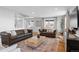 Bright and spacious living room featuring hardwood floors and stylish decor at 30484 Chisholm Trl, Elizabeth, CO 80107